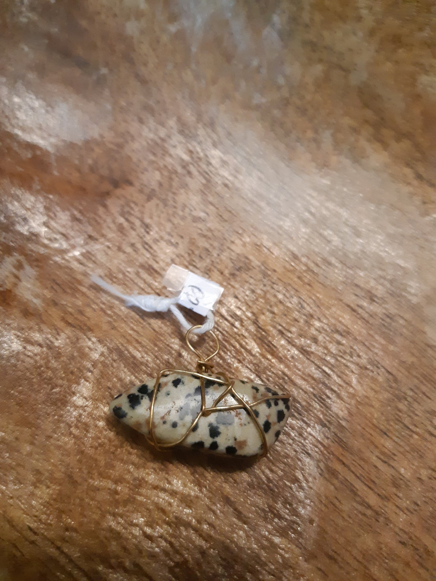 Dalmatian jasper wire wrapped pendants