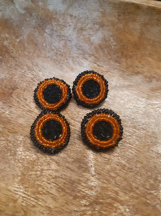 black and orange studs