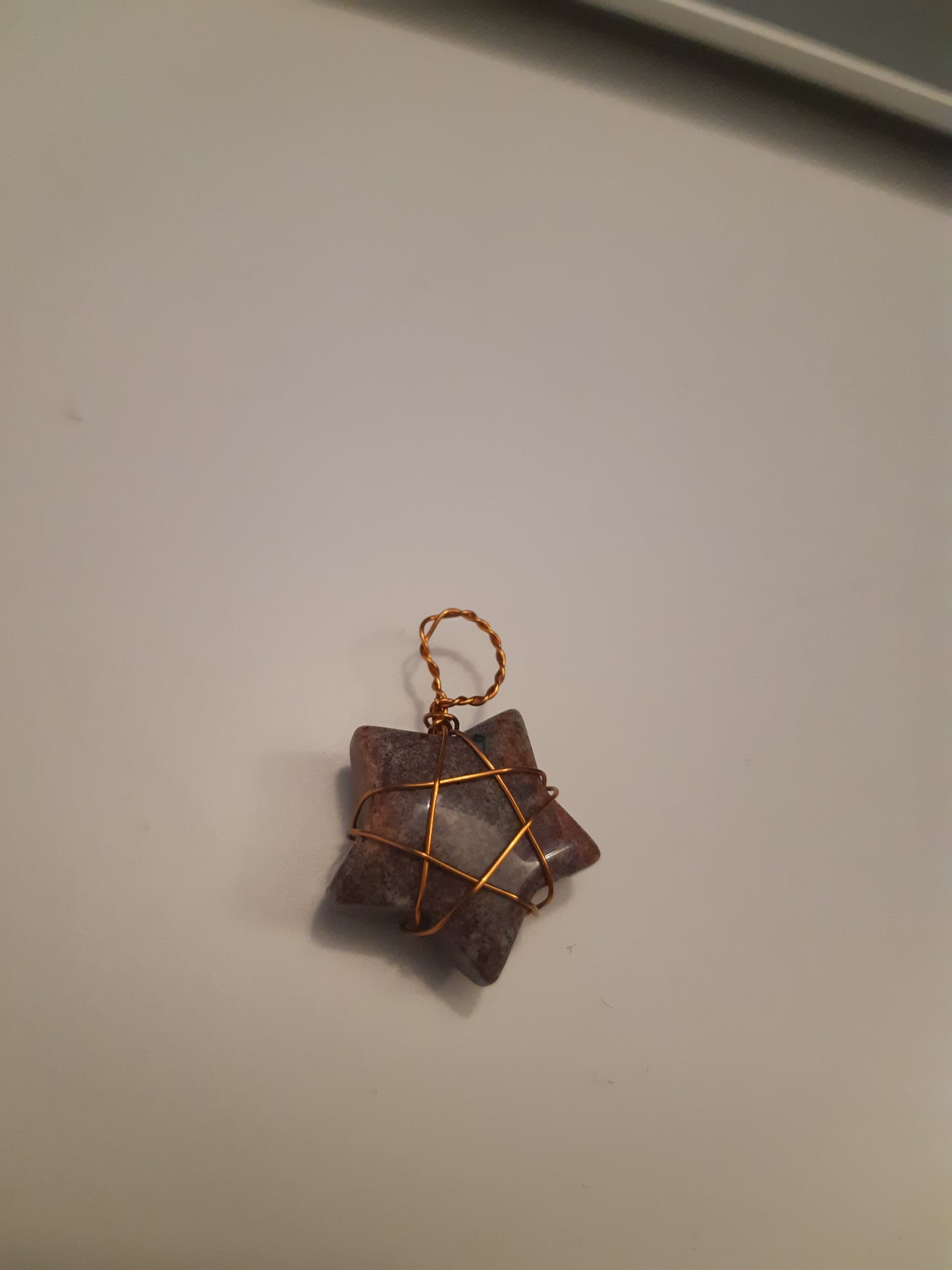 Wire-wrapped star pendants