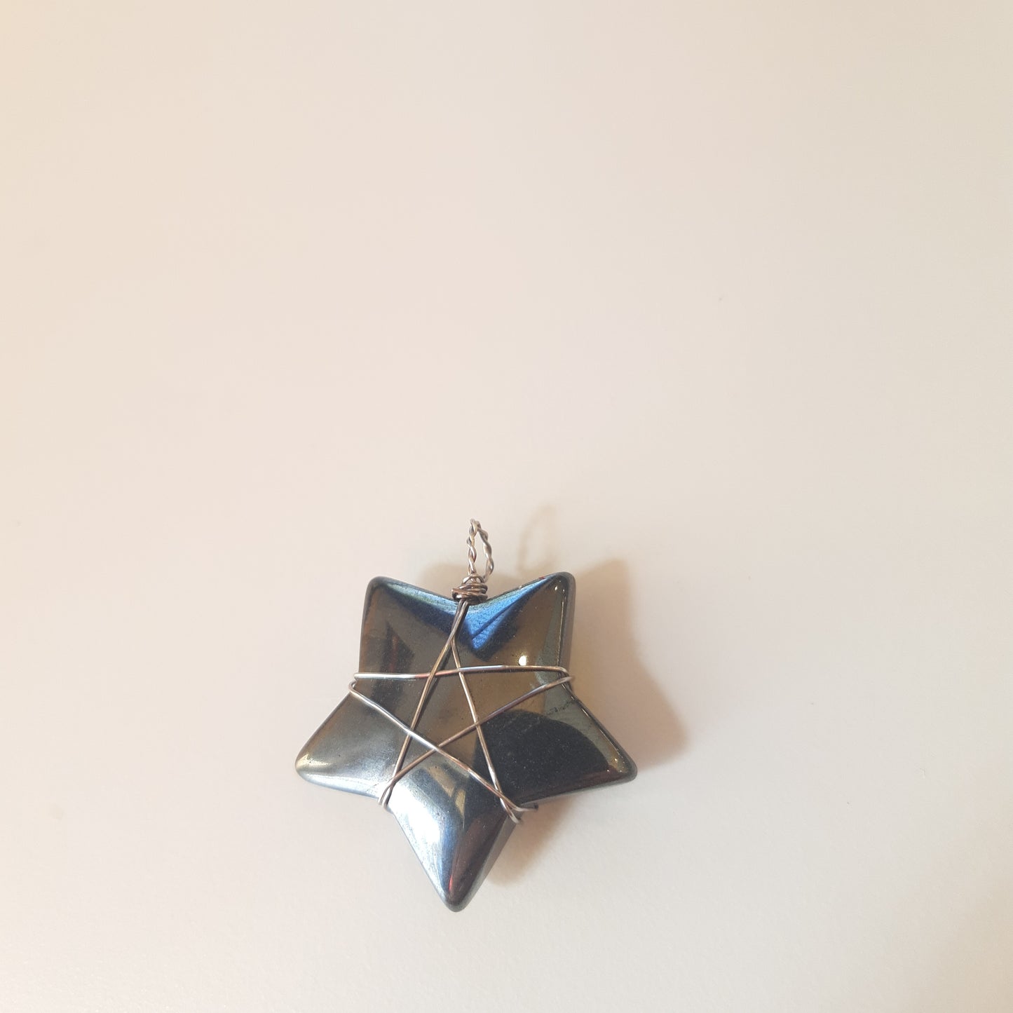 Wire-wrapped star pendants