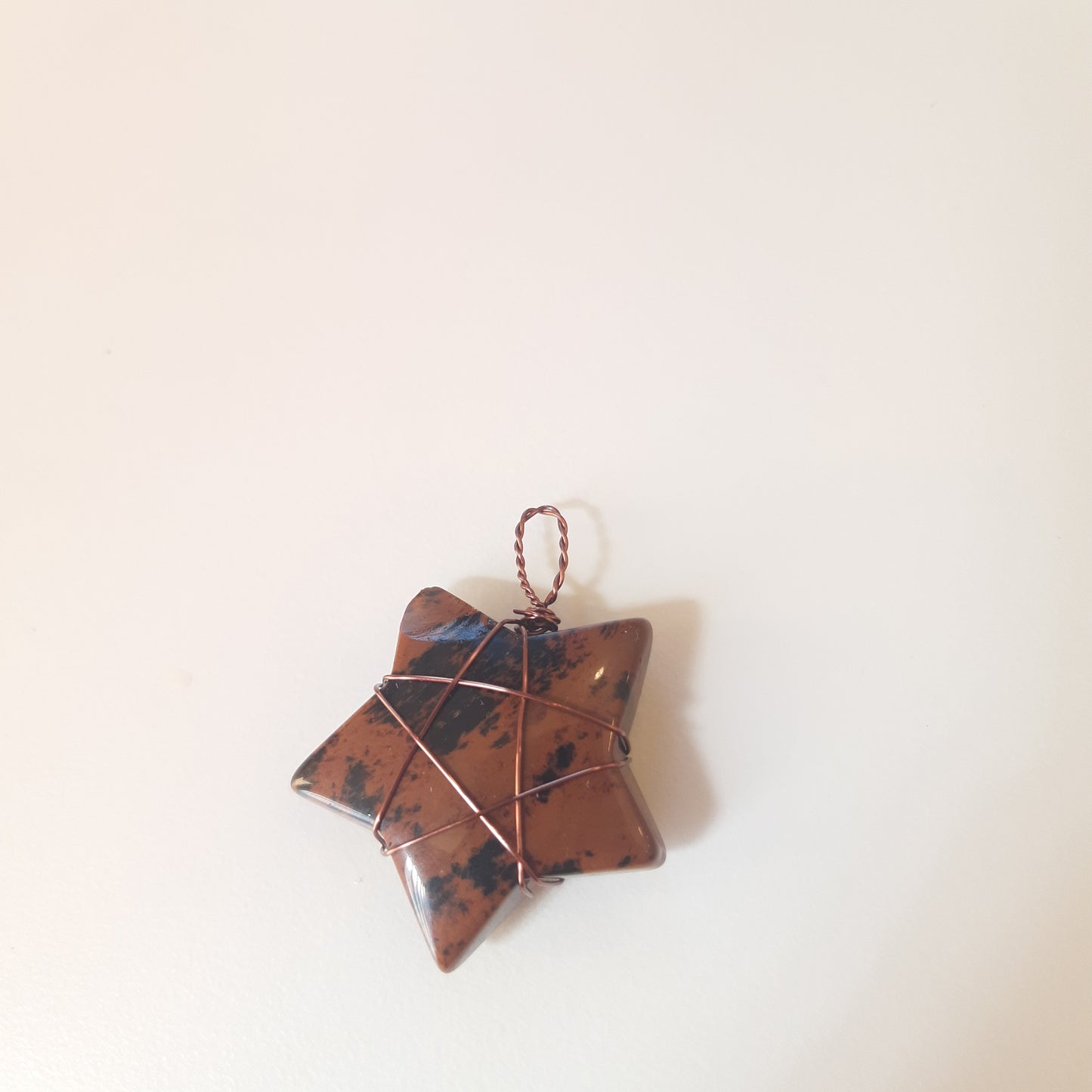 Wire-wrapped star pendants