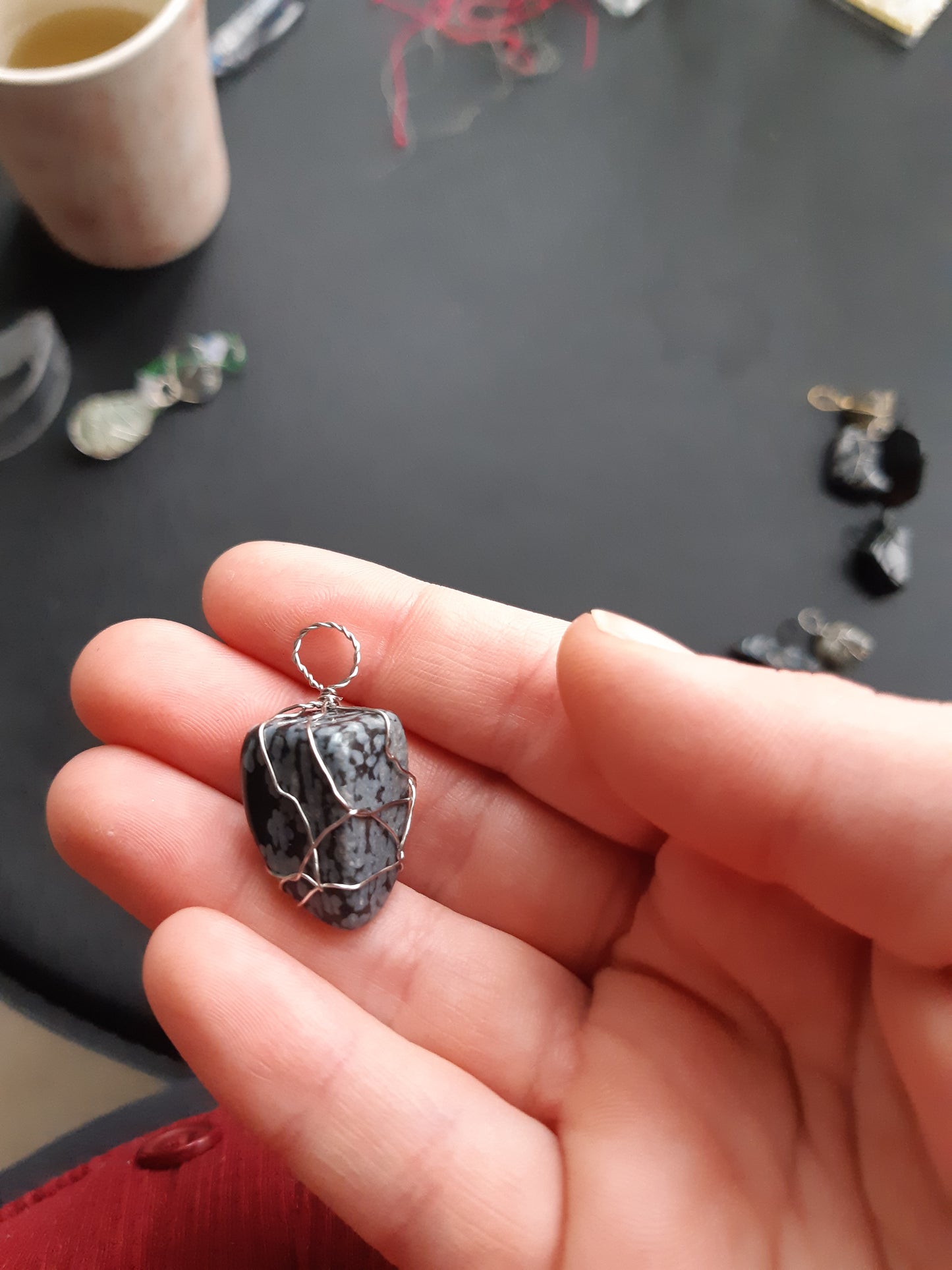 snowflake obsidian wire wrapped pendants