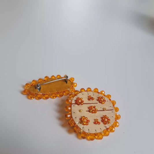 Orange floral bead soup birchbark pins