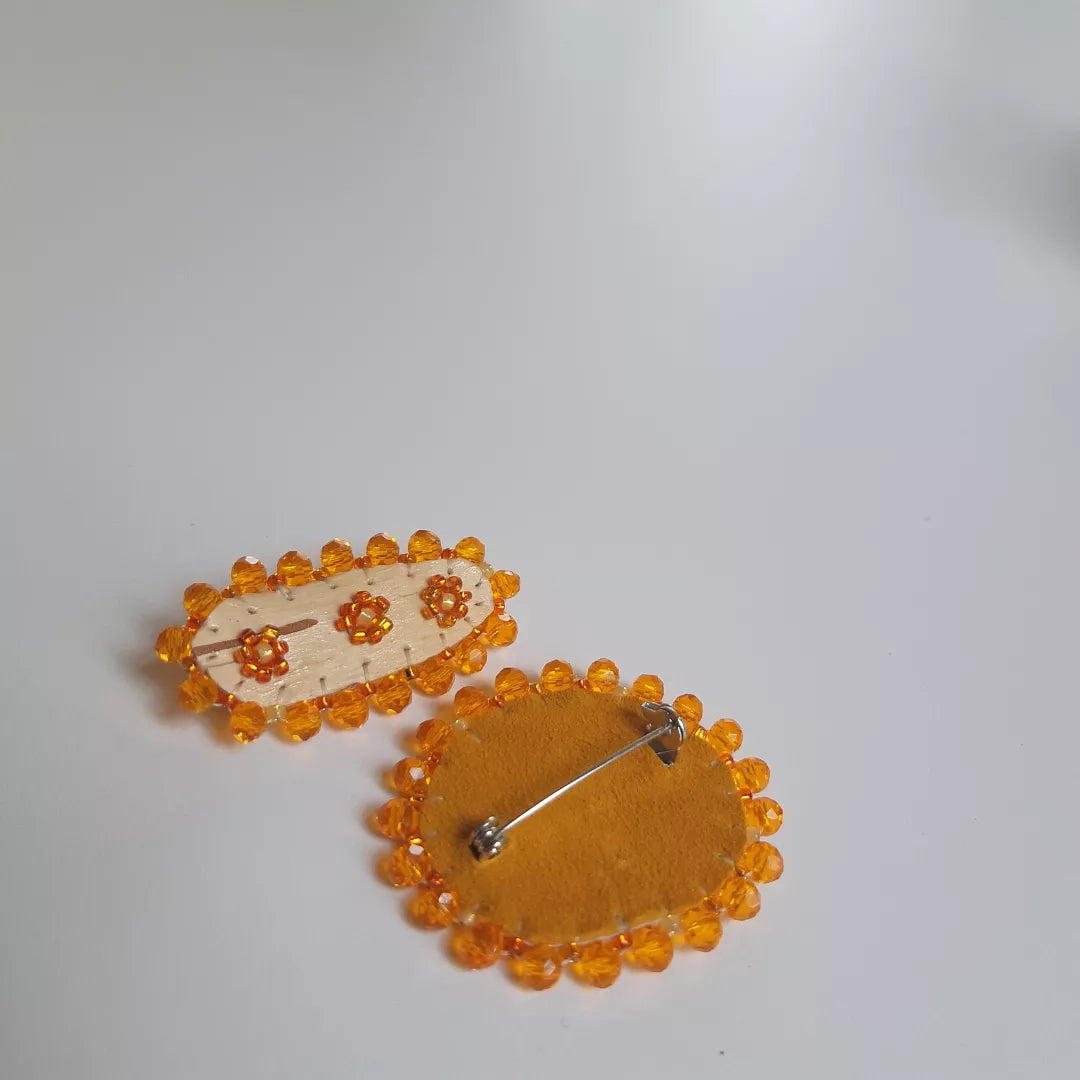 Orange floral bead soup birchbark pins