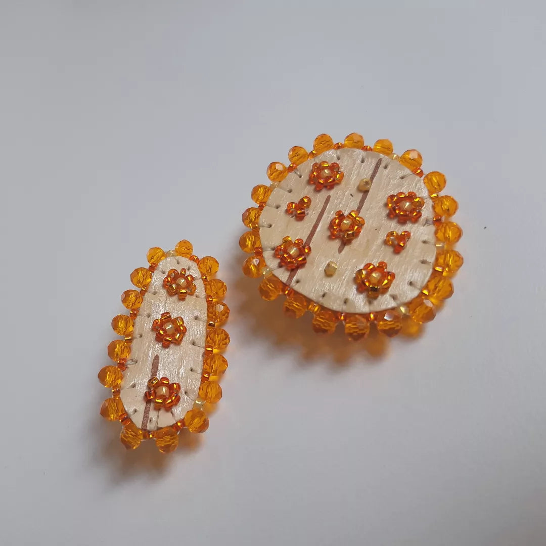 Orange floral bead soup birchbark pins