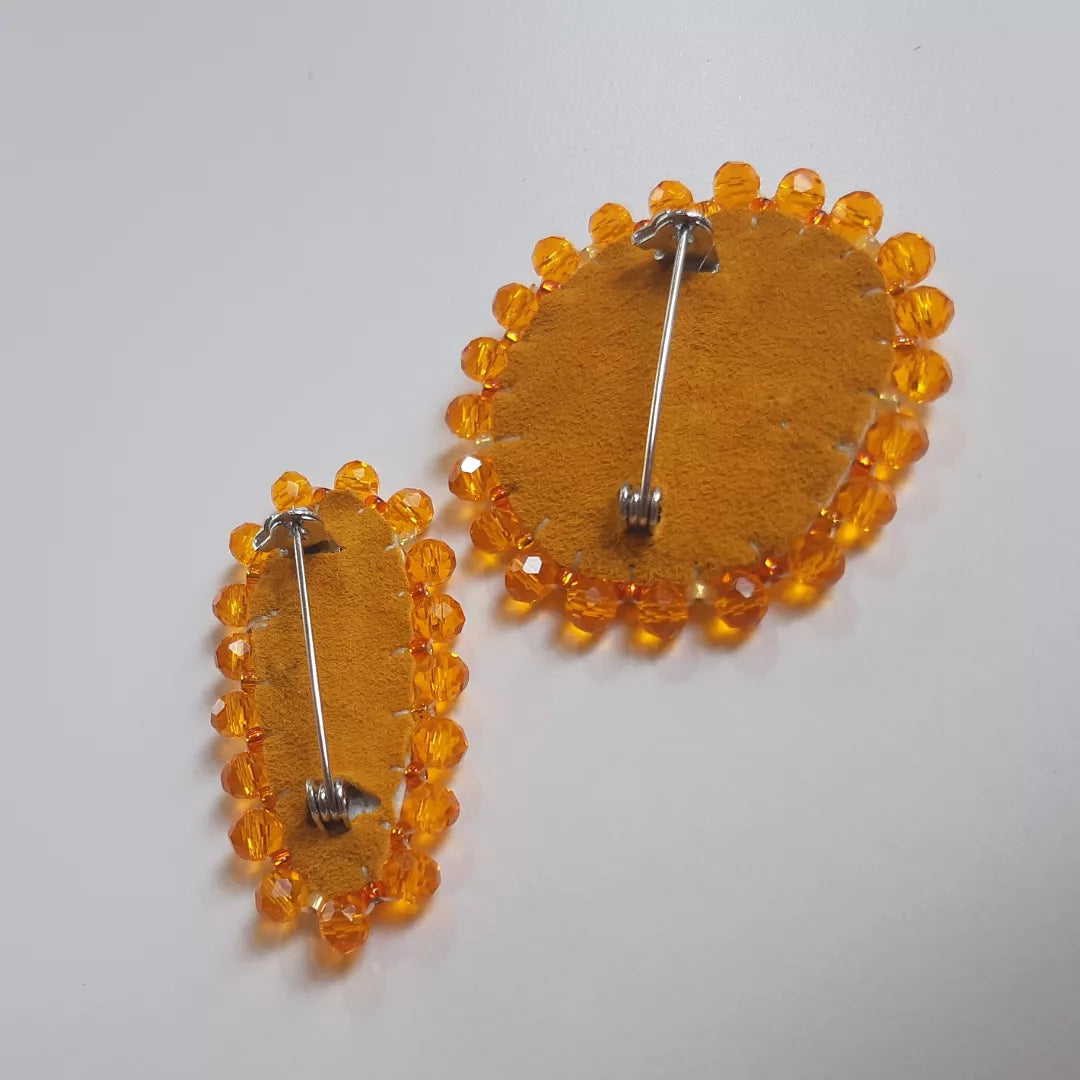 Orange floral bead soup birchbark pins