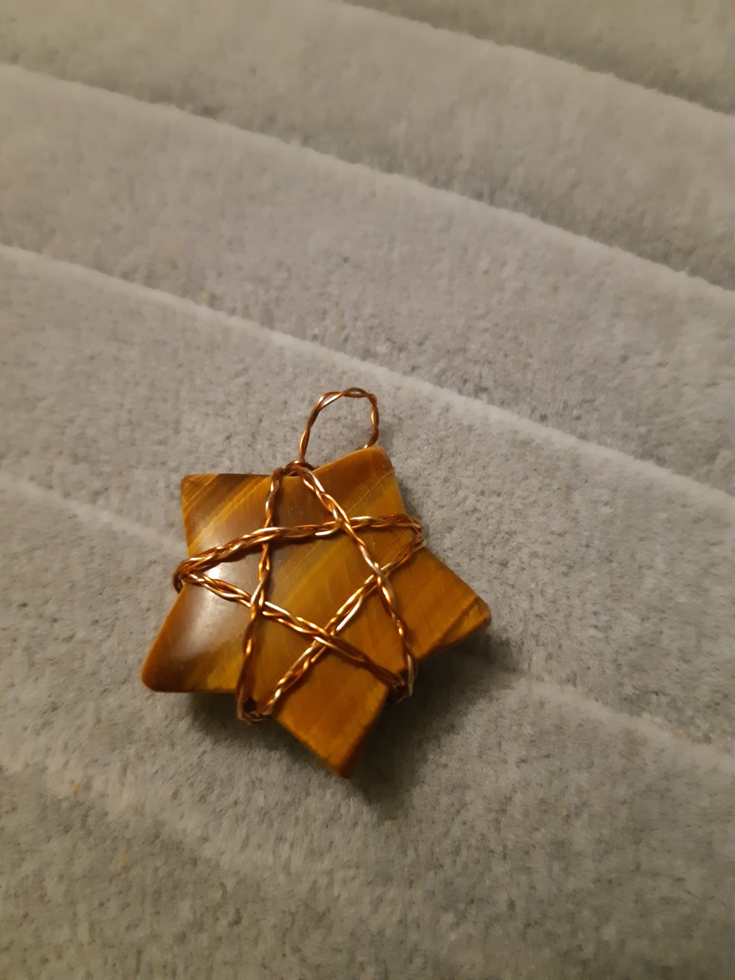 Wire-wrapped star pendants