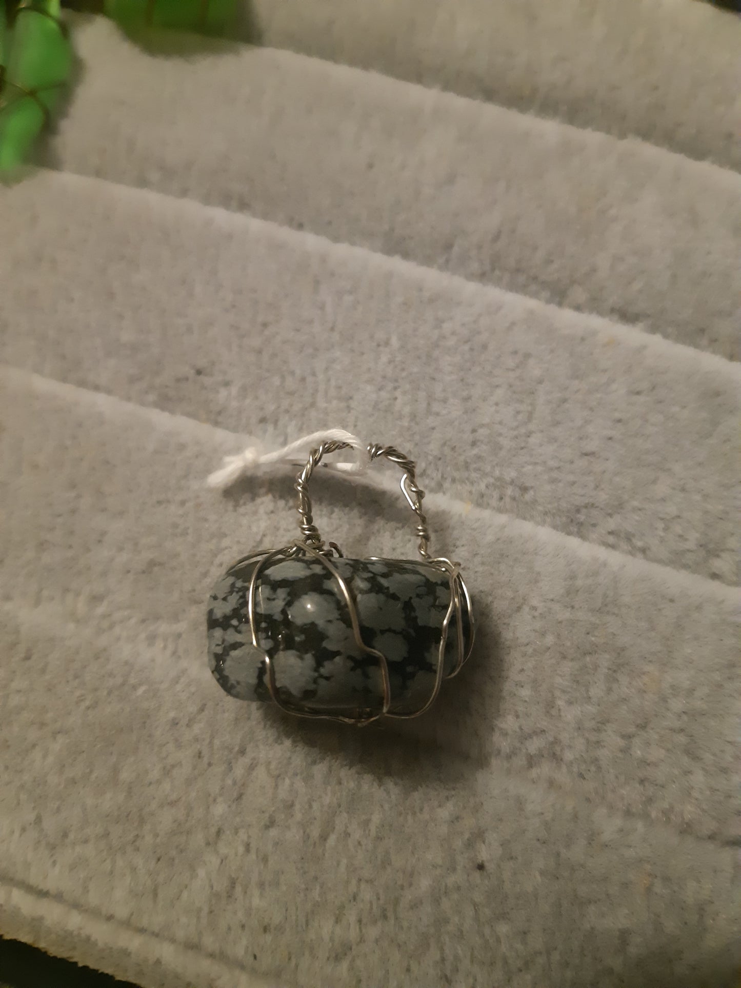 snowflake obsidian wire wrapped pendants