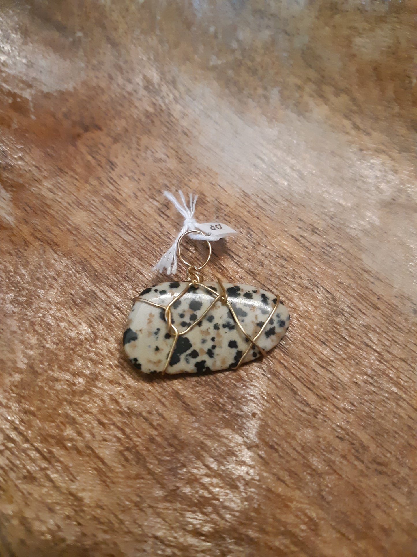 Dalmatian jasper wire wrapped pendants