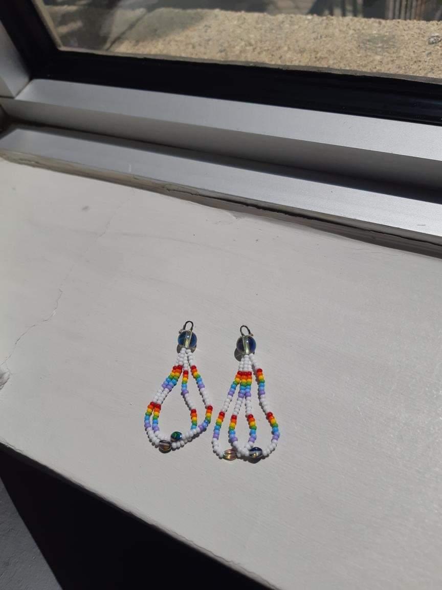 Rainbow lined white loops